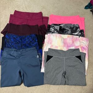 Bundle of 8 women’s workout leggings.